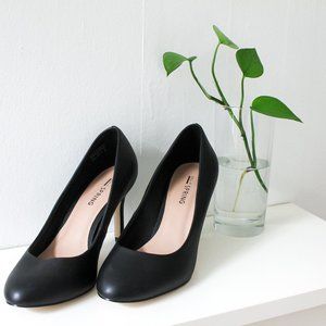 Mid-high heels pumps